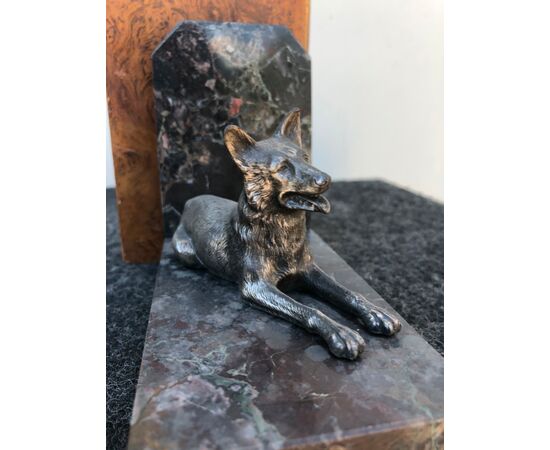 Pair of antimony and marble bookends depicting two German shepherd dogs.     