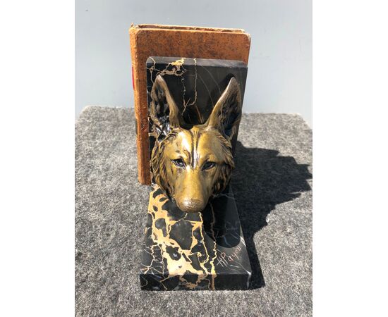 Pair of bronze and marble bookends depicting dog heads. Signature: H Payen. France.     