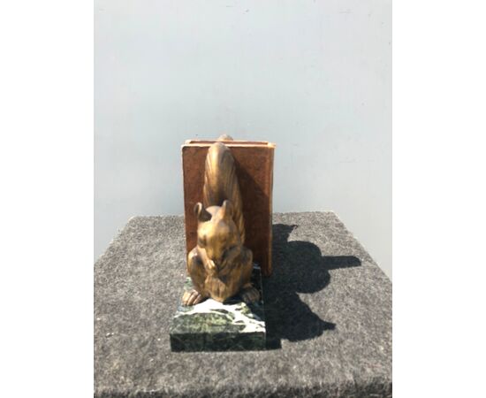 Pair of marble and golden antimony bookends depicting a pair of squirrels.     