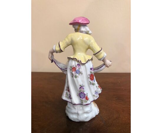 Porcelain figurine with female figure.Samson manufacture, France.     