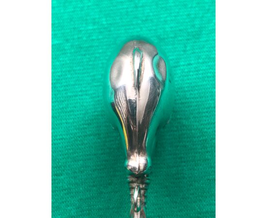Silver baby rattle with elephant figure.     