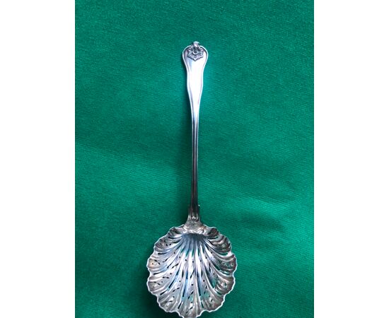 Silver metal spoon (christofle) with Cailar Bayard punch. Paris.     