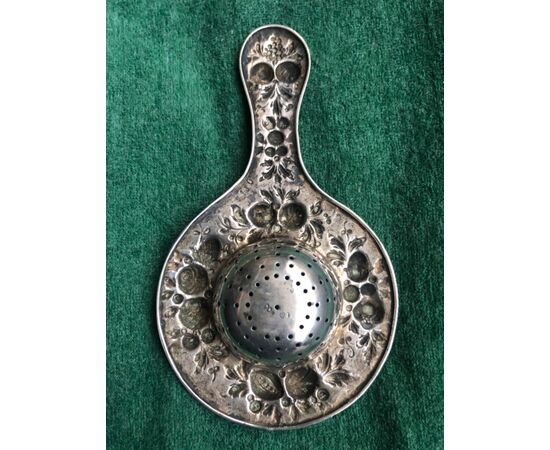 Tea strainer in silver with floral motifs.Germany.     