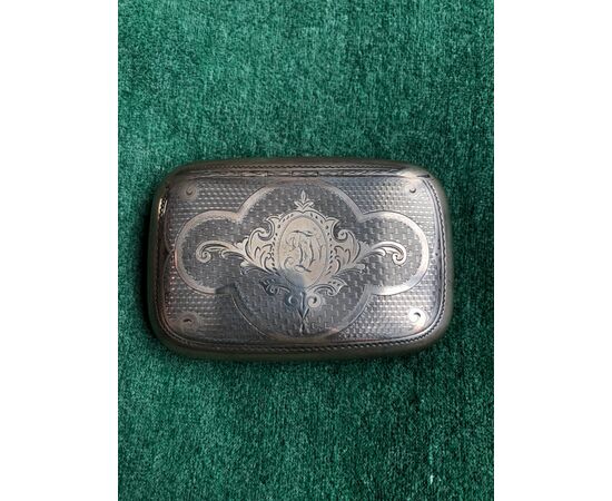 Tobacco cigarette box in silver with knurled pattern, shield with initials and date May 30, 1883.     
