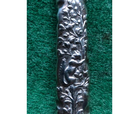 Silver perfume holder with figure in costume and squirrel with plant motifs. Sterling silver 925 punch.     