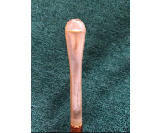 Nut-shaped briar pipe with mother of pearl mouthpiece.     