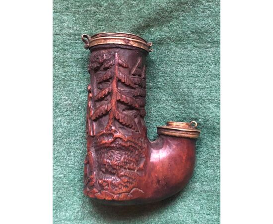 Wooden pipe carved with hunting scene.     