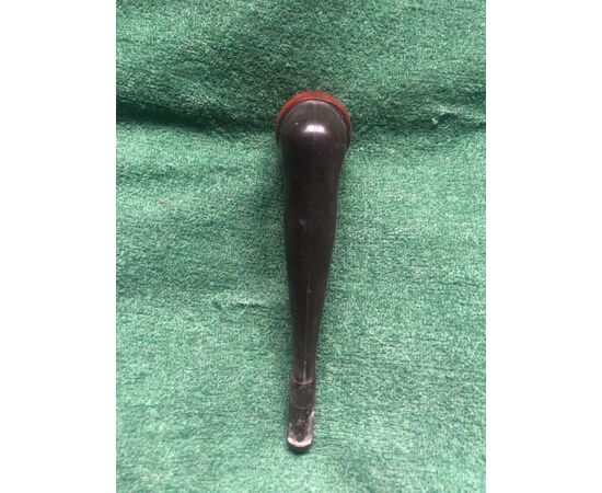 Wooden and bakelite pipe depicting a female leg.     