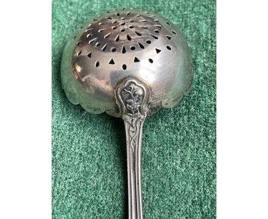 Silver colander with rocaille plant motifs. France     