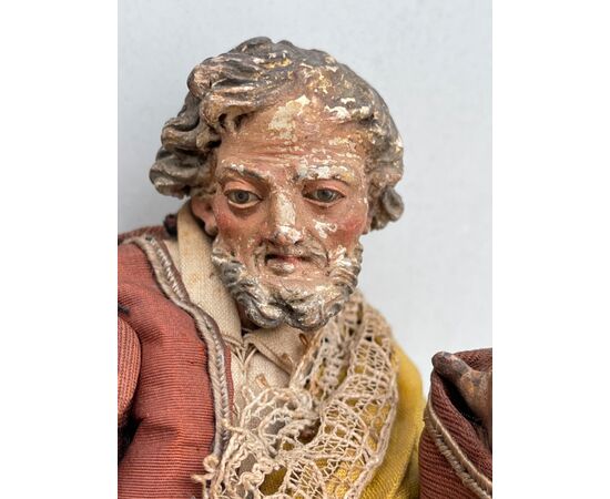 Neapolitan nativity figurine, male figure (Saint Joseph?) Terracotta head with glass eyes.     