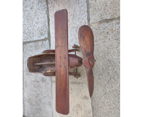 Toy plane made of wood and iron     