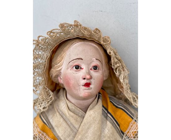 Statuina da presepe napoletano,figura femminile.Testa in terracotta con occhi di vetro.