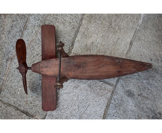 Toy plane made of wood and iron     