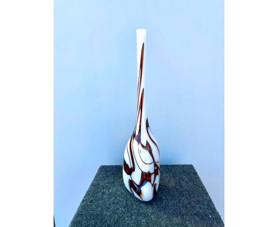 Milky blown glass vase with triangular section polychrome inclusions.Murano.     