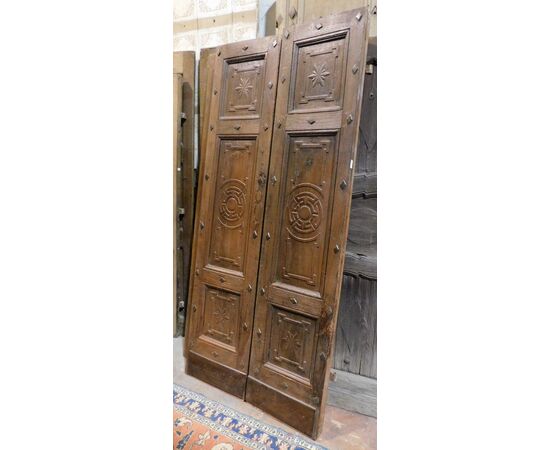 ptci358 door in walnut with carved decorations, meas. 96 x 211 x 6.5 cm     