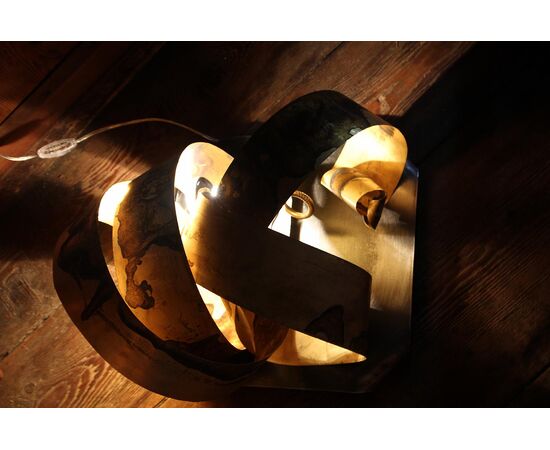 Turning point belt lamp in brass with oxidation bluish made by Simona Ambrosini