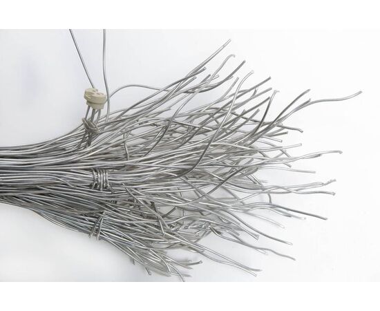 Wall lamp in steel wires - design     