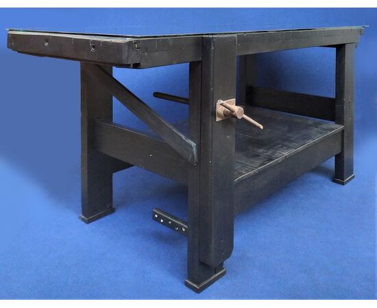 Carpenter&#39;s table in black lacquered wood and glass top - Italy 20th century.     