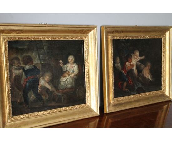 Antica coppia di dipinti epoca XVIII sec “ Gioco Di Putti “ cornice foglia oro . Mis 36 x cm 41 