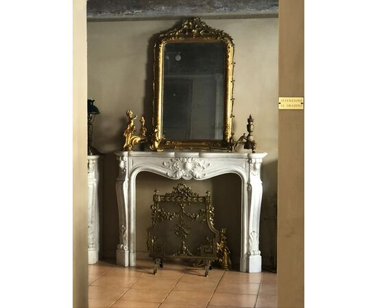 medium-sized fireplace in white Carrara marble     