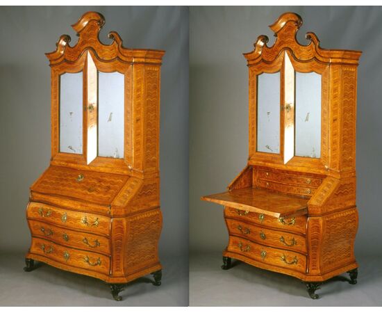 Modena, first half of the 18th century, Trumeau in first patina with shaped shape and wavy molding, geometric patch inlay and diamond-coated doors     