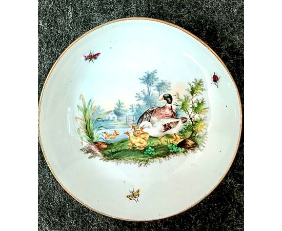 Porcelain saucer depicting ducks and ducklings with rural landscape.Meissen manufacture.     