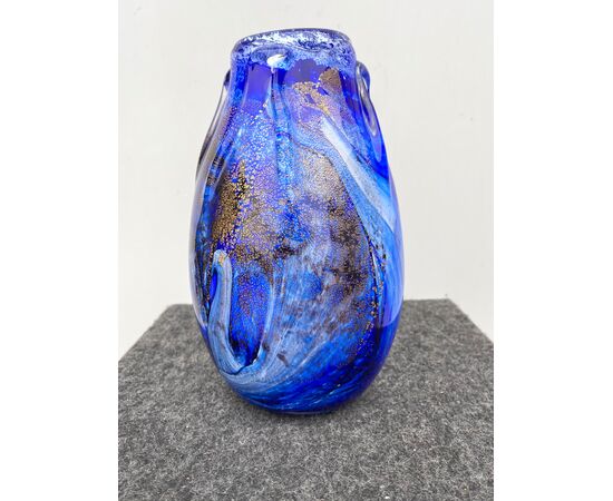 Vase in heavy sommerso glass with inclusions of milky and gold leaf variegations.Manifattura A.Ve.M.Murano.     