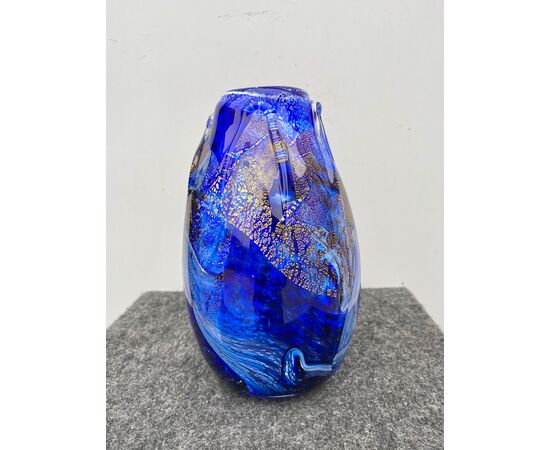 Vase in heavy sommerso glass with inclusions of milky and gold leaf variegations.Manifattura A.Ve.M.Murano.     