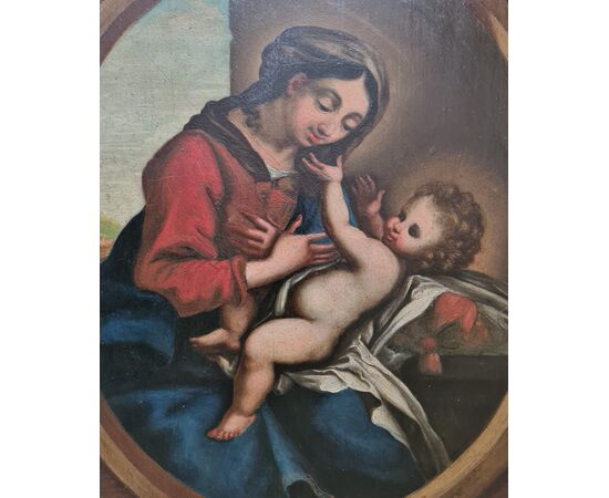 Scuola Emiliana del XVII secolo seguace del Correggio. “Madonna con Gesù Bambino”