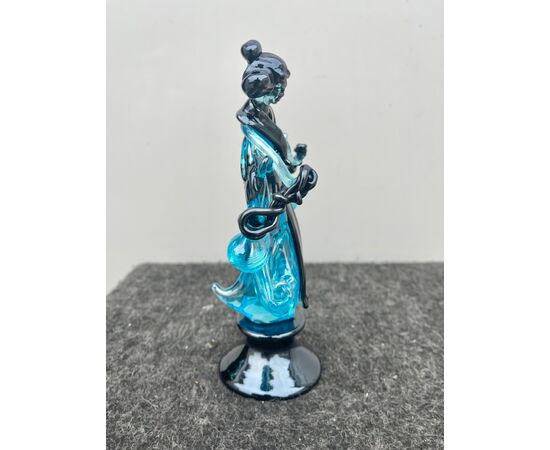 Oriental geisha figure in iridescent glass.Nason manufacture, Murano.     