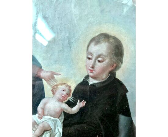 Dipinto olio su tela raffigurante San Stanislao Kostka,Madonna con Gesu’Bambino e cherubini.Italia.