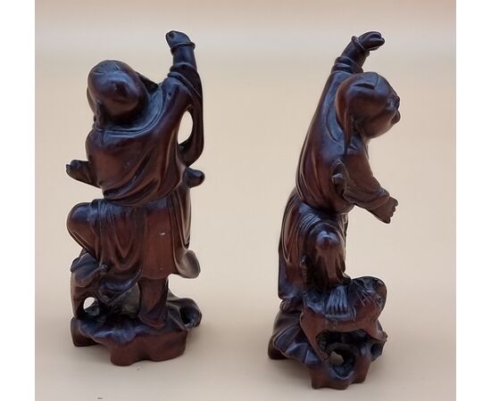 Coppia di sculture in legno