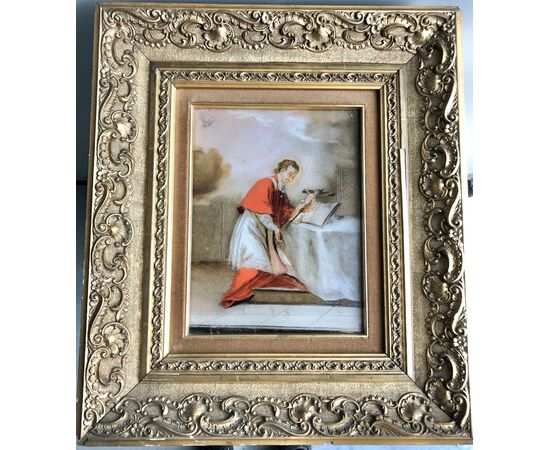 Painting on glass depicting Saint Luigi Gonzaga.Golden wood frame with rocaille motifs in relief in pastiglia.Italy     