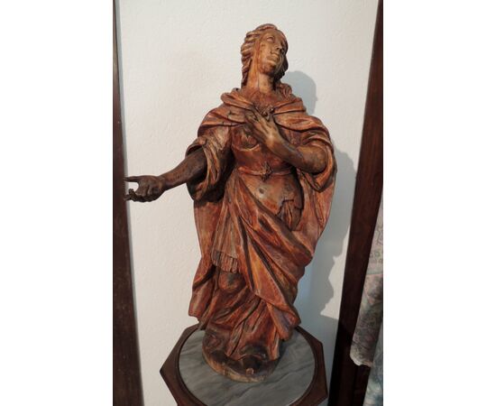 wooden statue, h 79 cm x width. 45 cm     