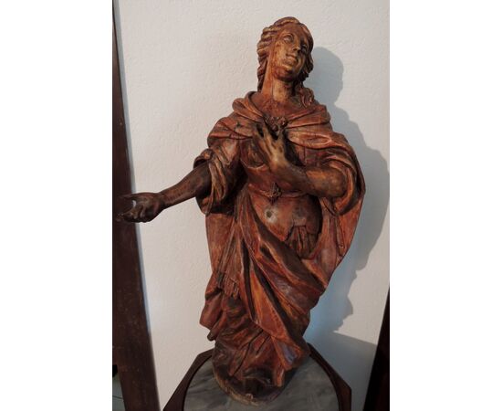 wooden statue, h 79 cm x width. 45 cm     