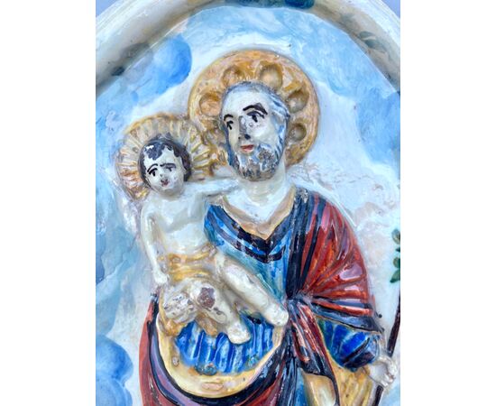 Formella devozionale in maiolica raffigurante San Giuseppe e Gesu’Bambino.Imola