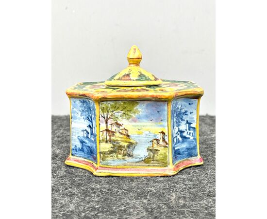 Octagonal-shaped majolica inkwell with Castelli-style landscape scenes alternating in blue and monochromatic colors.Manifattura Minghetti.Bologna.     