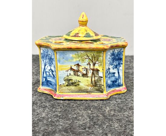 Octagonal-shaped majolica inkwell with Castelli-style landscape scenes alternating in blue and monochromatic colors.Manifattura Minghetti.Bologna.     