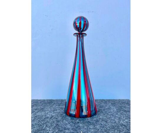 Bottle with round glass stopper with red-blue vertical bands.Murano.     