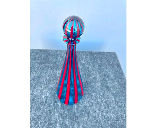 Bottle with round glass stopper with red-blue vertical bands.Murano.     