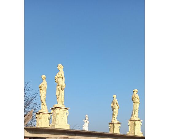 Four seasons statues in cast iron with pedestal     
