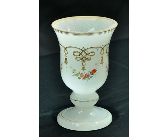 Goblet in milky glass with floral decorations