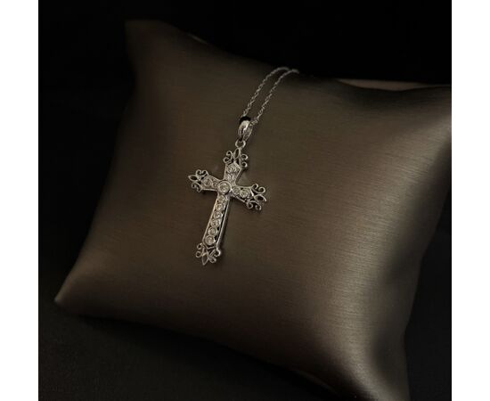 Cross pendant with Diamonds.     