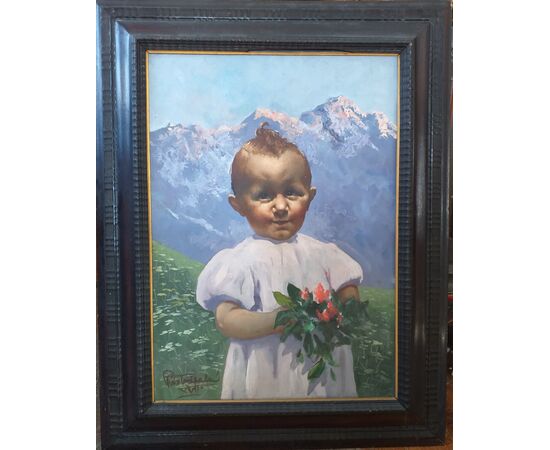 Portrait of little girl with mountain flowers     