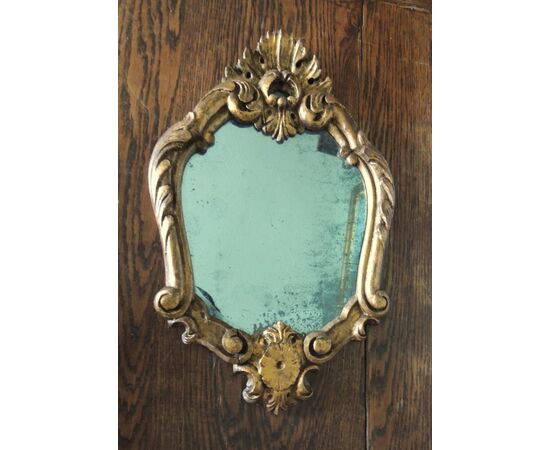 Small carved mirror, meas. 45 x 29 cm
