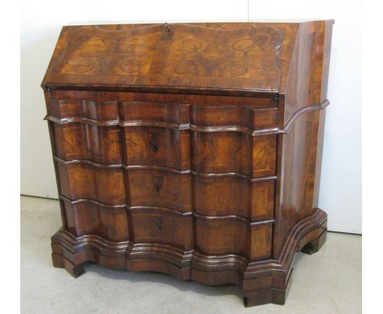 Antique shaped chest of drawers with flap door. Early 1900s     