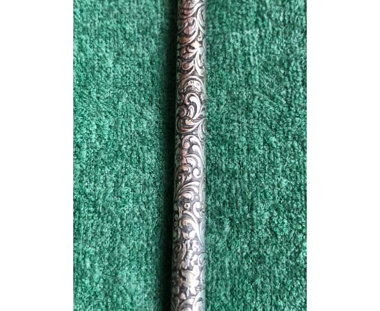 Silver pen with leaf swirl decorations. Ivory detail.     