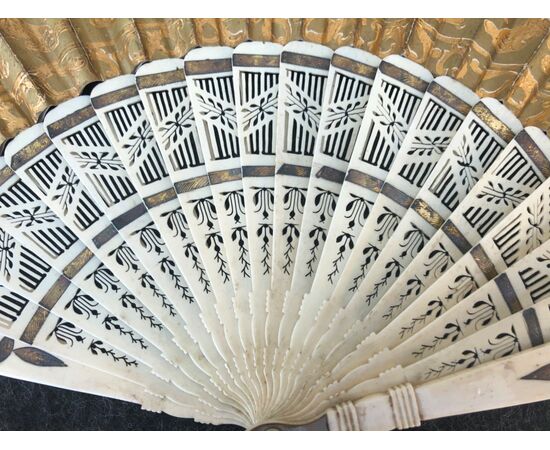 Openwork ivory fan with Pavese paper with watercolor prints with gallant and rustic scenes. France.     