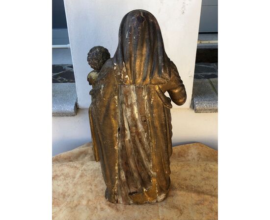 Ancient wooden sculpture Madonna with Child     
