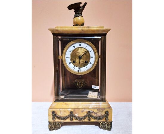 Marble reliquary clock with bronze sculptures from the mid-19th century